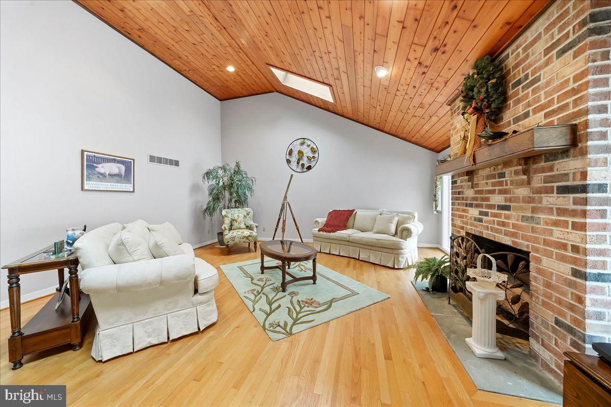 531 Chandler Mill Road Kennett Square, PA 19348 - Photo 16 of 60 a living room with furniture and a fireplace