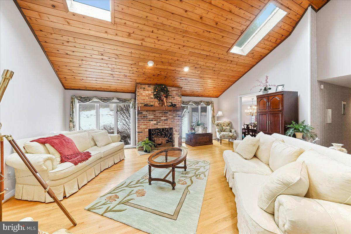 531 Chandler Mill Road Kennett Square, PA 19348 - Photo 17 of 60 a living room with furniture and a fireplace
