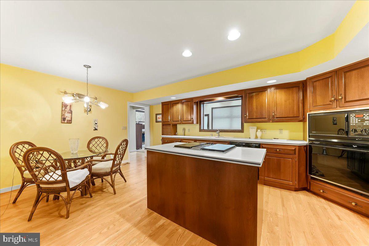 531 Chandler Mill Road Kennett Square, PA 19348 - Photo 23 of 60 a kitchen with wooden cabinets and stainless steel appliances