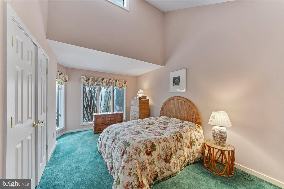 531 Chandler Mill Road Kennett Square, PA 19348 - Photo 32 of 60 a bedroom with a bed and window