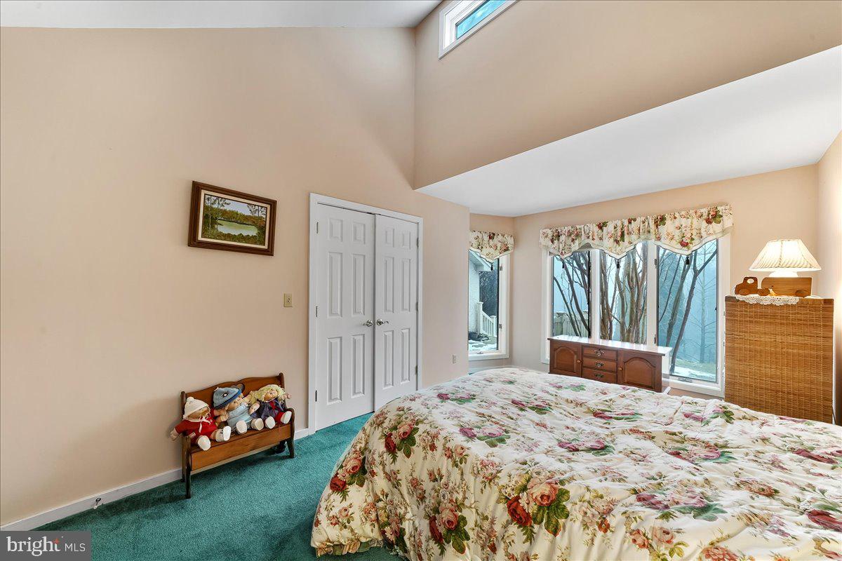 531 Chandler Mill Road Kennett Square, PA 19348 - Photo 33 of 60 a bedroom with a bed and a window