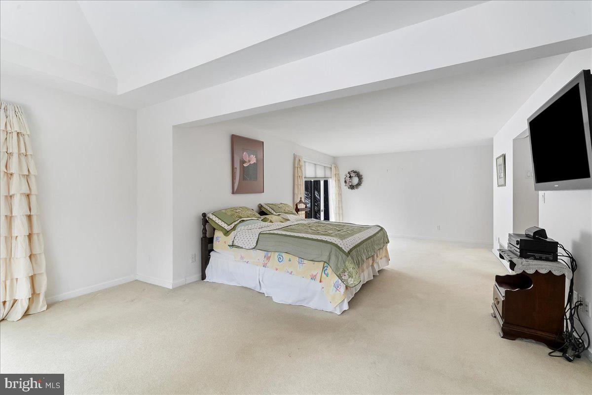 531 Chandler Mill Road Kennett Square, PA 19348 - Photo 38 of 60 a bedroom with a bed and a flat screen tv