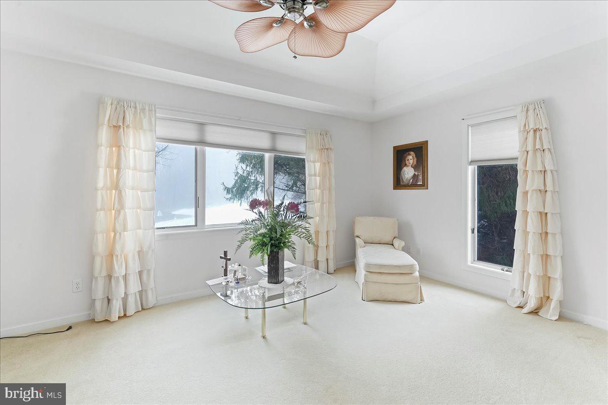 531 Chandler Mill Road Kennett Square, PA 19348 - Photo 39 of 60 a living room with furniture and a chandelier