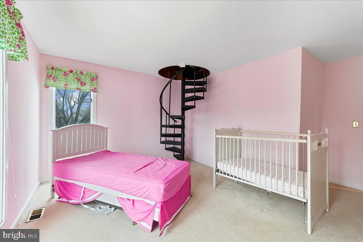 531 Chandler Mill Road Kennett Square, PA 19348 - Photo 44 of 60 a bedroom with a bed and a window