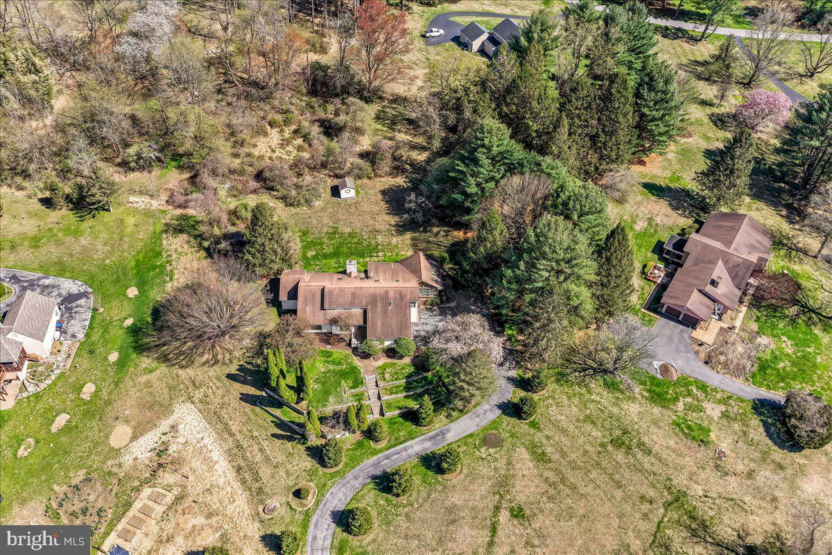 531 Chandler Mill Road Kennett Square, PA 19348 - Photo 53 of 60 an aerial view of a house with a yard