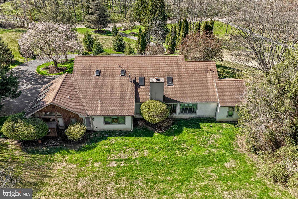 531 Chandler Mill Road Kennett Square, PA 19348 - Photo 57 of 60 an aerial view of a house with yard and green space