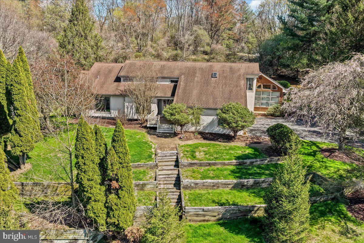531 Chandler Mill Road Kennett Square, PA 19348 - Photo 59 of 60 an aerial view of a house with a yard