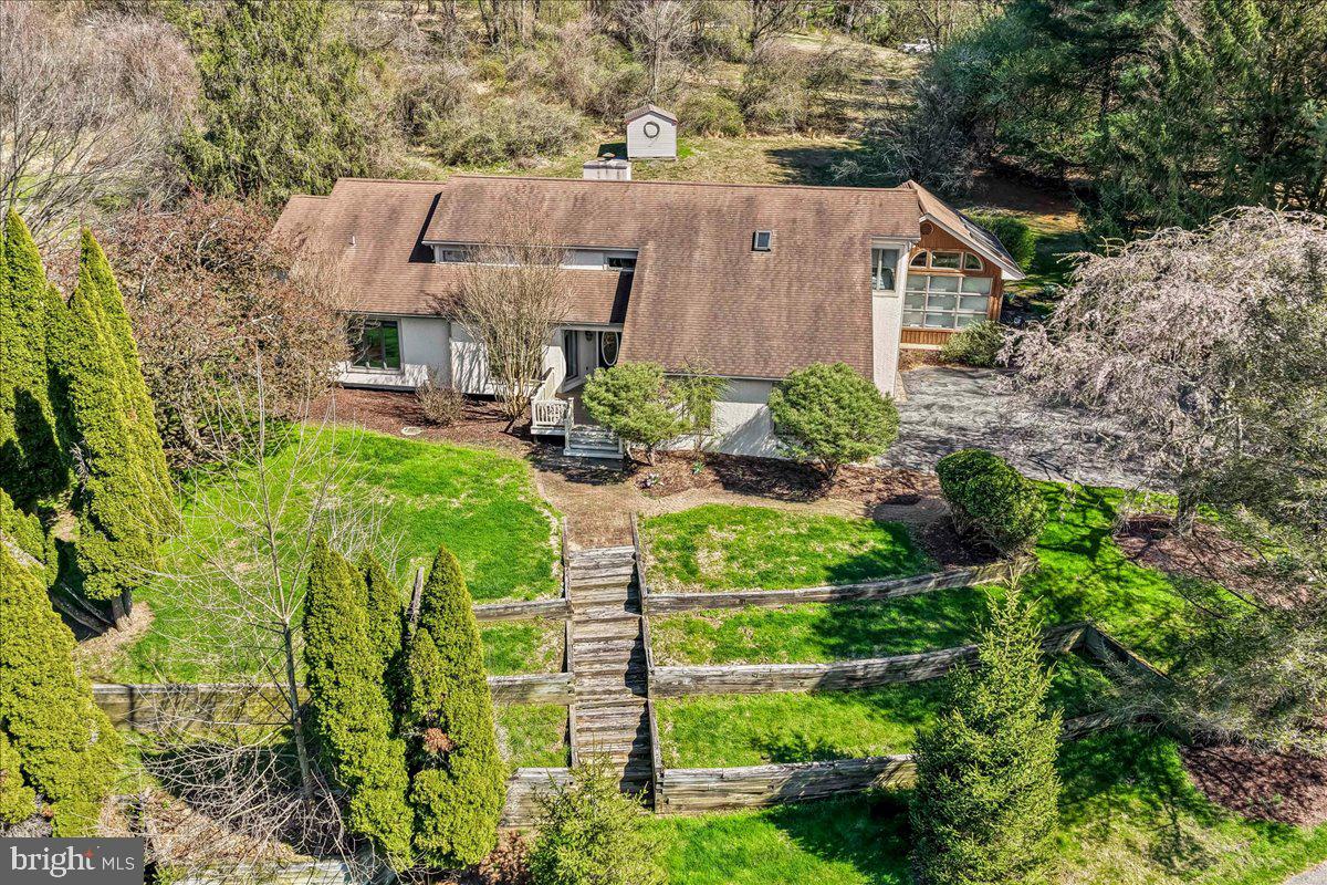 531 Chandler Mill Road Kennett Square, PA 19348 - Photo 60 of 60 an aerial view of a house with yard and green space