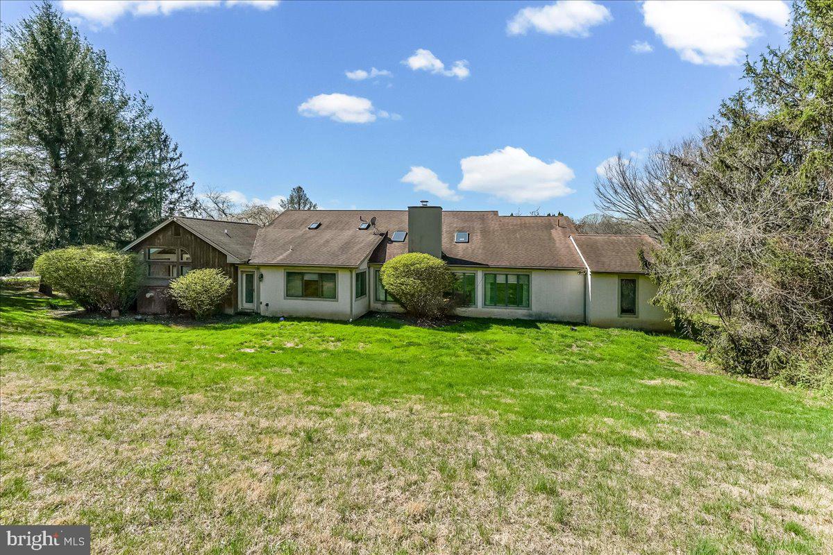 531 Chandler Mill Road Kennett Square, PA 19348 - Photo 6 of 60 a front view of a house with a garden