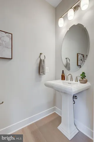 a living room with fireplace furniture and a flat screen tv