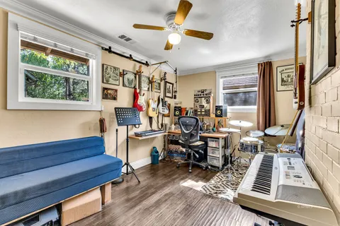 a kitchen with stainless steel appliances a stove a sink and a microwave