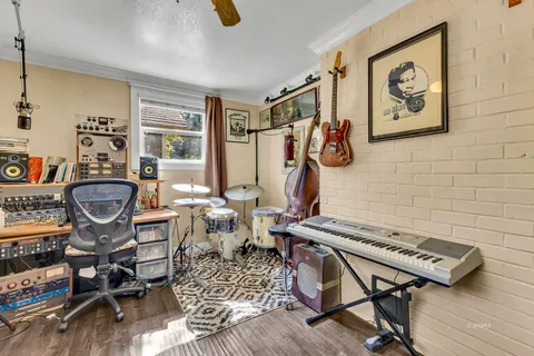 a kitchen with stainless steel appliances granite countertop a refrigerator and a stove