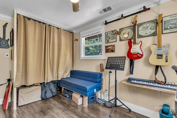 a living room with furniture and a window