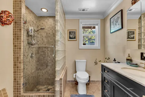 a view of a house with backyard tub and sitting area