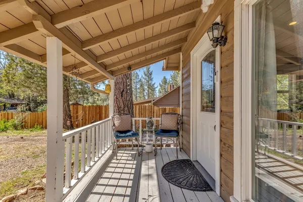 a view of balcony with furniture