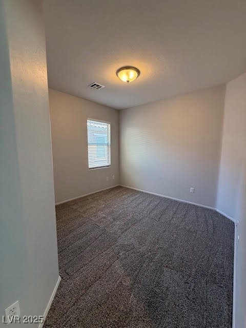 766 Crest Valley Place Henderson, NV 89011 - Photo 11 of 14 Carpeted empty room featuring baseboards