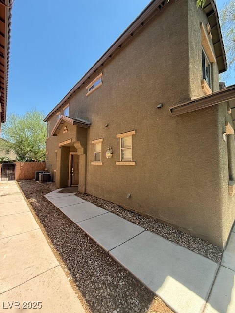 766 Crest Valley Place Henderson, NV 89011 - Photo 14 of 14 View of property exterior featuring stucco siding