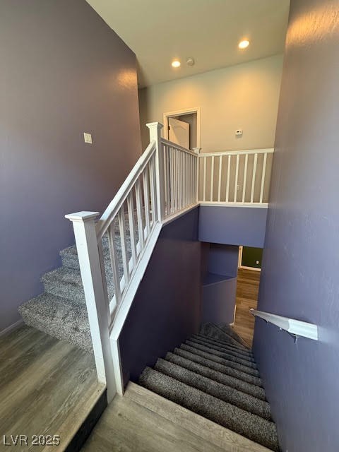 766 Crest Valley Place Henderson, NV 89011 - Photo 4 of 14 Staircase featuring wood finished floors and reces
