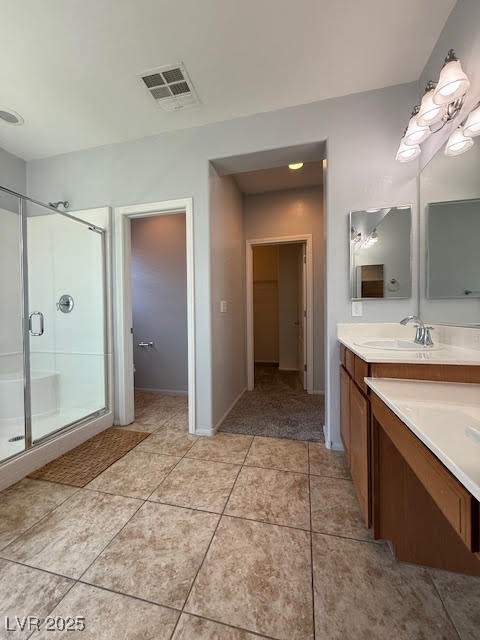 766 Crest Valley Place Henderson, NV 89011 - Photo 9 of 14 Full bath with vanity, a shower stall, and tile pa