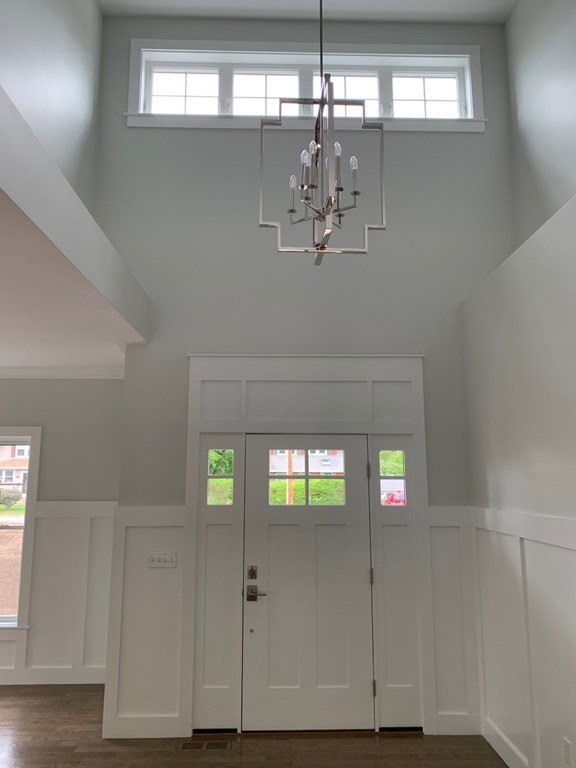135 South S Road Holden, MA 01520 - Photo 23 of 25 a view of a chandelier fan in a hall with an entryway