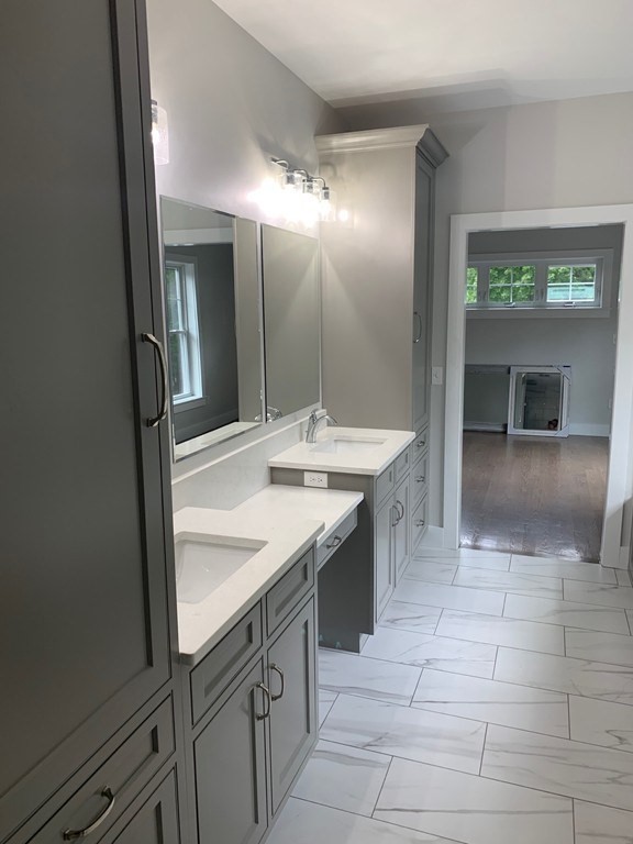 135 South S Road Holden, MA 01520 - Photo 25 of 25 a bathroom with a sink double vanity and a mirror