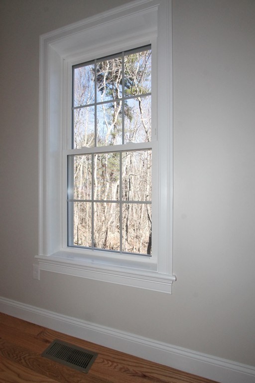 135 South S Road Holden, MA 01520 - Photo 9 of 25 a view of a small space with wooden floor and a window