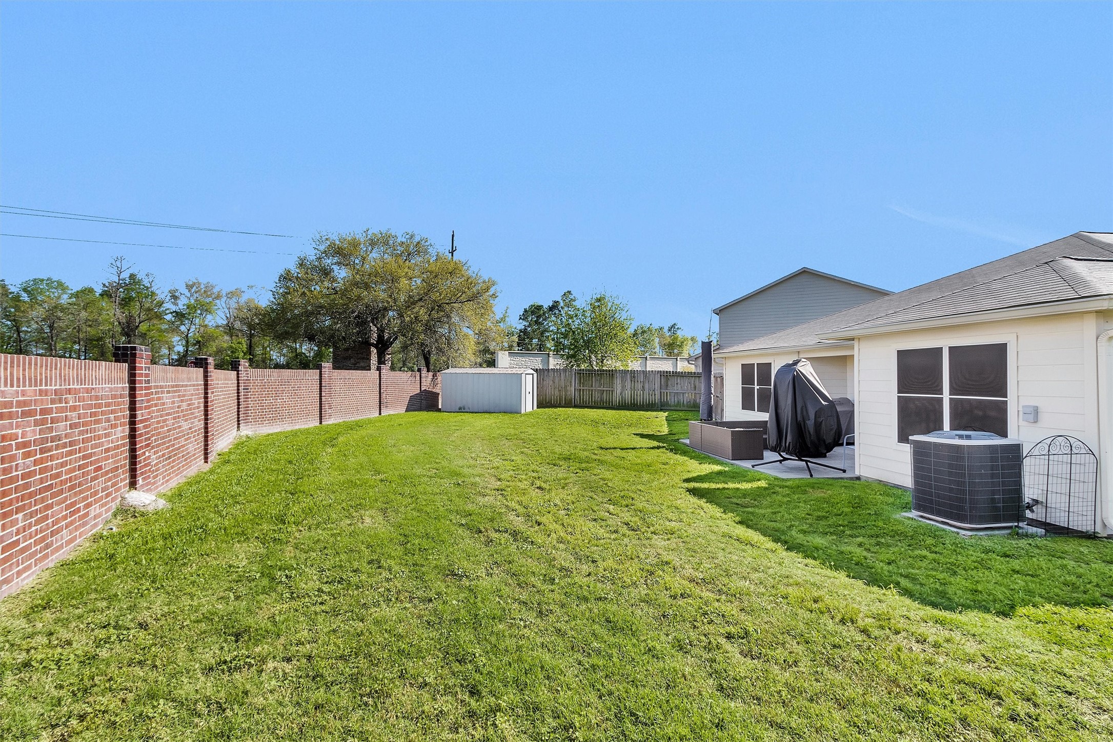 4802 Comal River Loop Spring, TX 77386 - Photo 20 of 20 Nice storage shed for all the extras. Huge backyard with plenty enough room for whatever your heart desires.