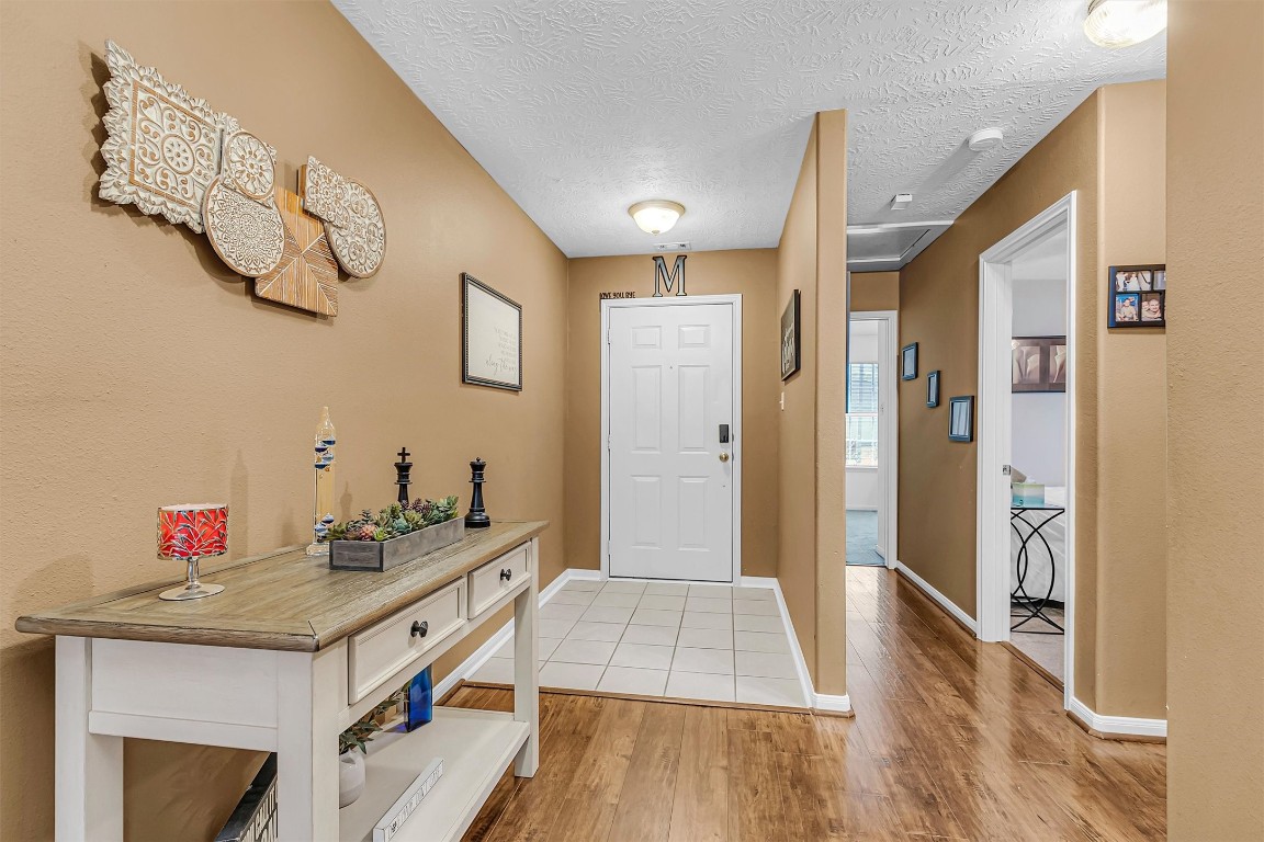 4802 Comal River Loop Spring, TX 77386 - Photo 2 of 20 Looking back towards the front door from the living room.
