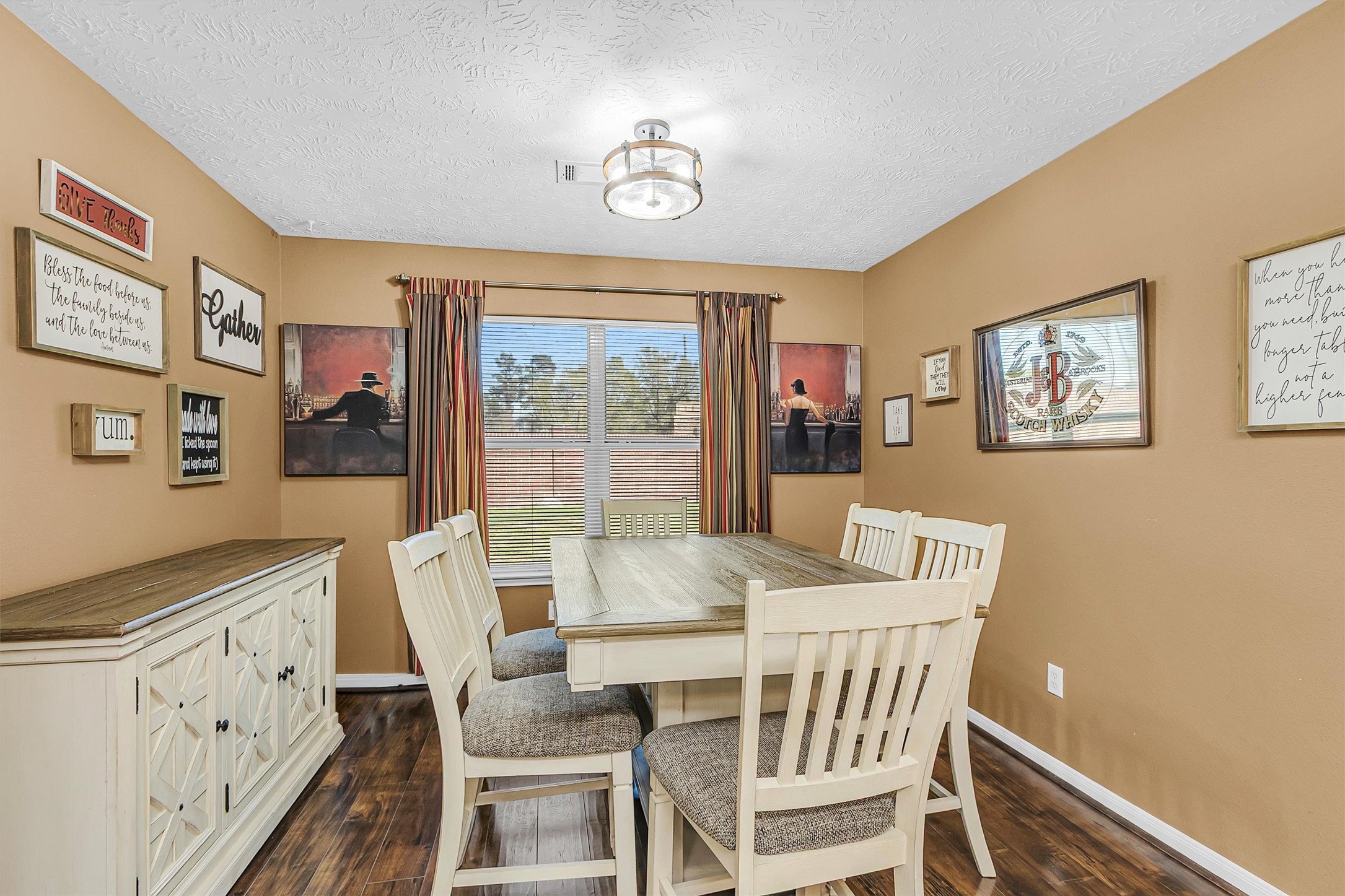 4802 Comal River Loop Spring, TX 77386 - Photo 7 of 20 Dining room with a large window overlooking the backyard.