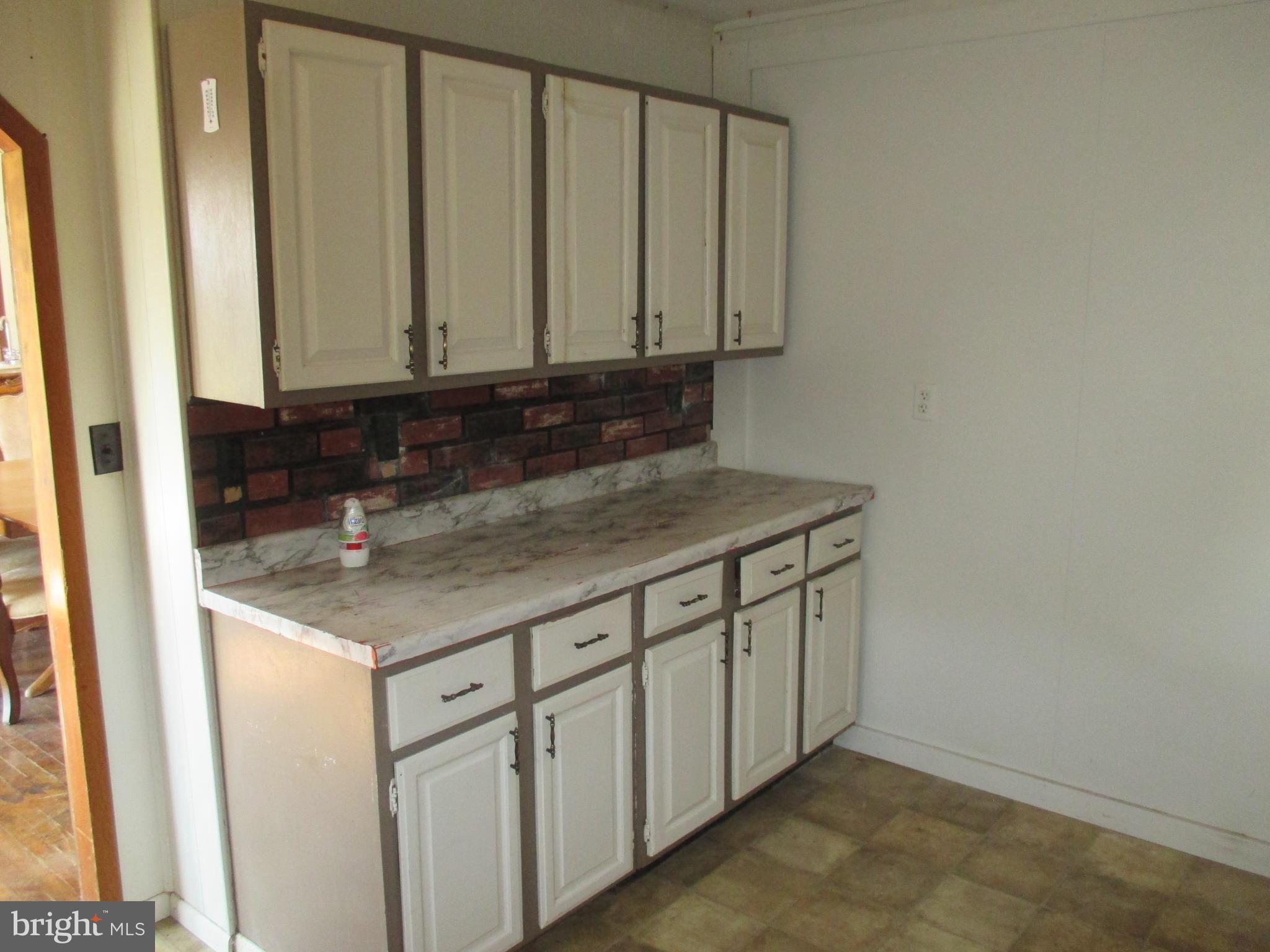 11198 Knobley Road Keyser, WV 26726 - Photo 13 of 24 a bathroom with a sink and a mirror