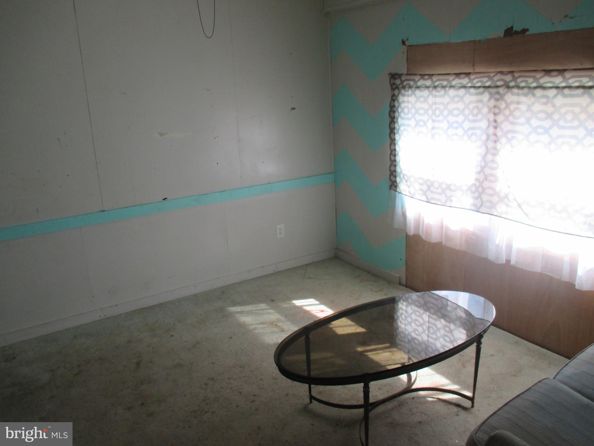 11198 Knobley Road Keyser, WV 26726 - Photo 14 of 24 a backyard of a house with table and chairs