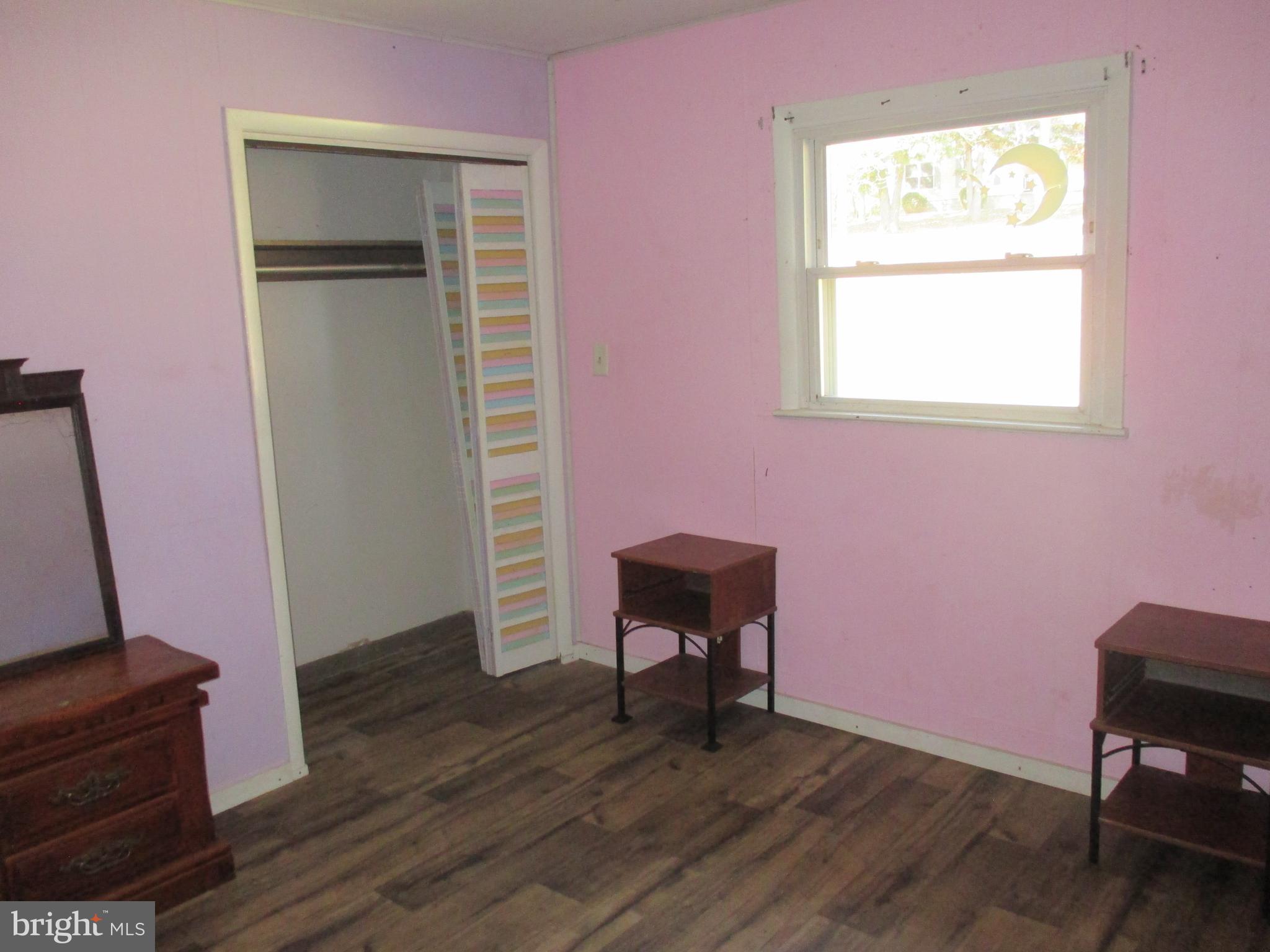 11198 Knobley Road Keyser, WV 26726 - Photo 17 of 24 a view of a workspace with furniture and a window