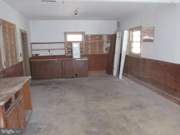 a view of a kitchen with a sink
