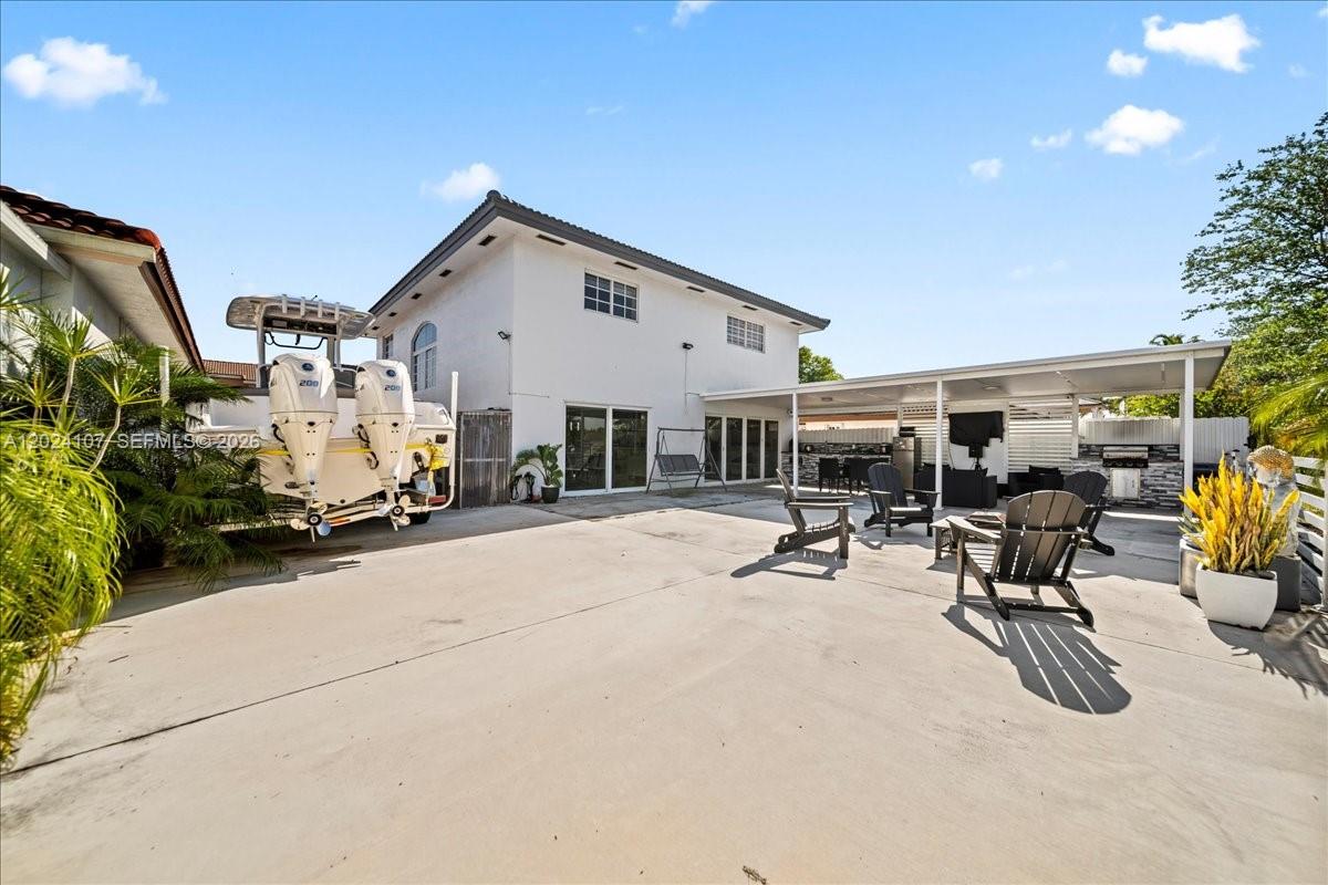 15341 Southwest 36th Street Miami, FL 33185 - Photo 46 of 56 a view of a yard with furniture