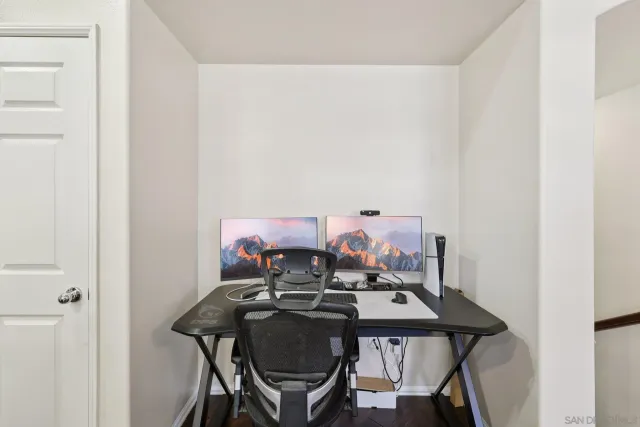 a view of a workspace with furniture