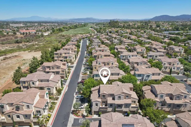 an aerial view of residential building with outdoor space