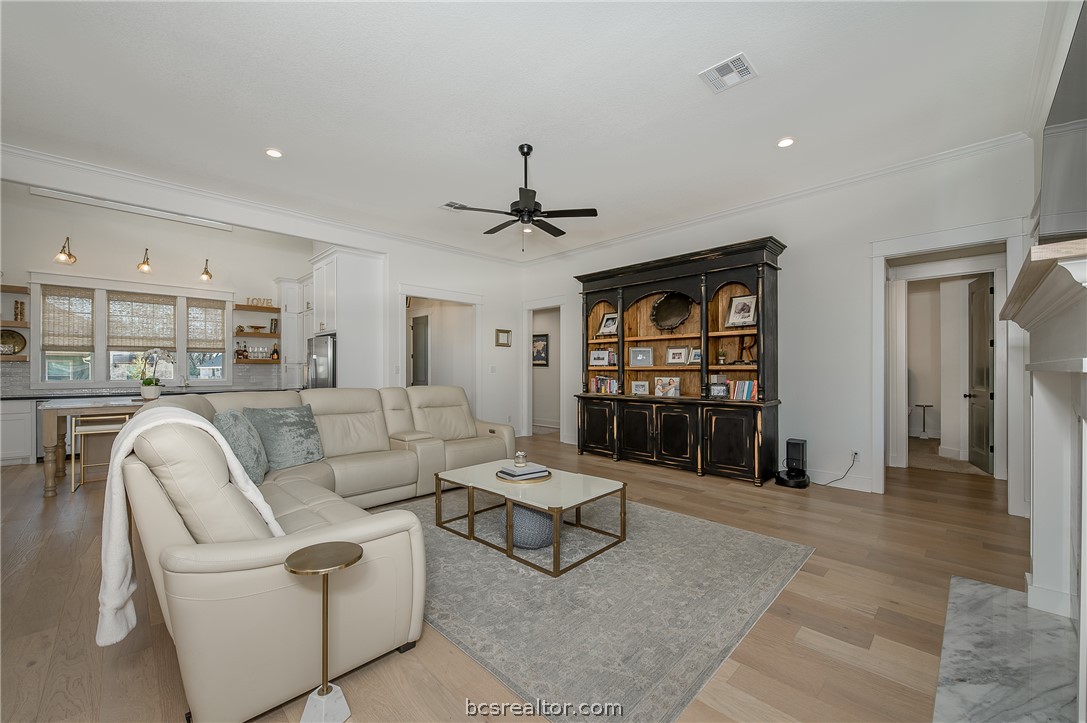 3317 Stone Leigh Lane Bryan, TX 77808 - Photo 5 of 30 a living room with furniture and a ceiling fan