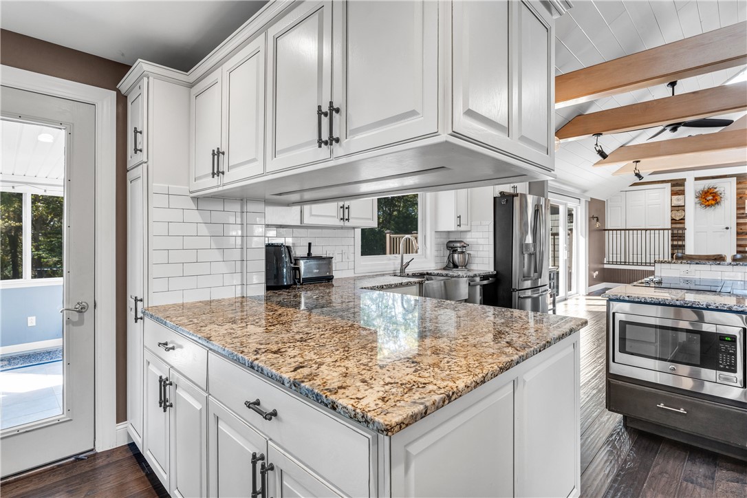 12 Pickering Drive Westerly, RI 02891 - Photo 16 of 47 door to sunroom off the kitchen