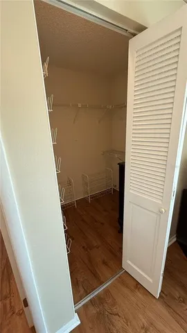 a view of a room with racks on the wall