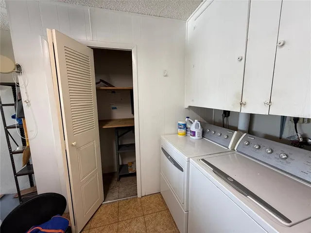 a utility room with a washer and dryer