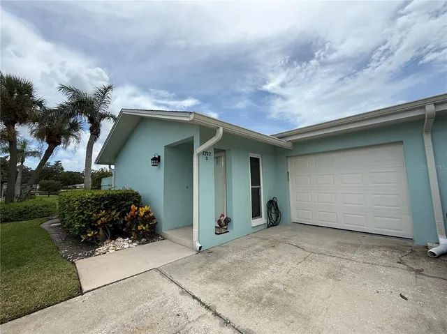 a view of a door and chair and table