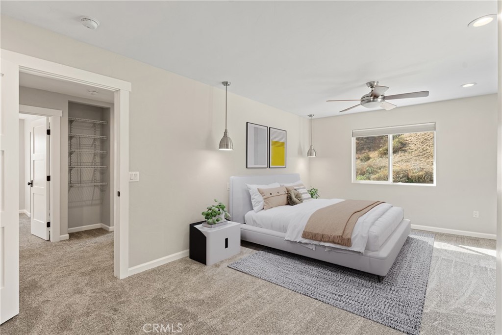 30300 Live Oak Canyon Road Redlands, CA 92373 - Photo 28 of 67 a bedroom with a bed and a window