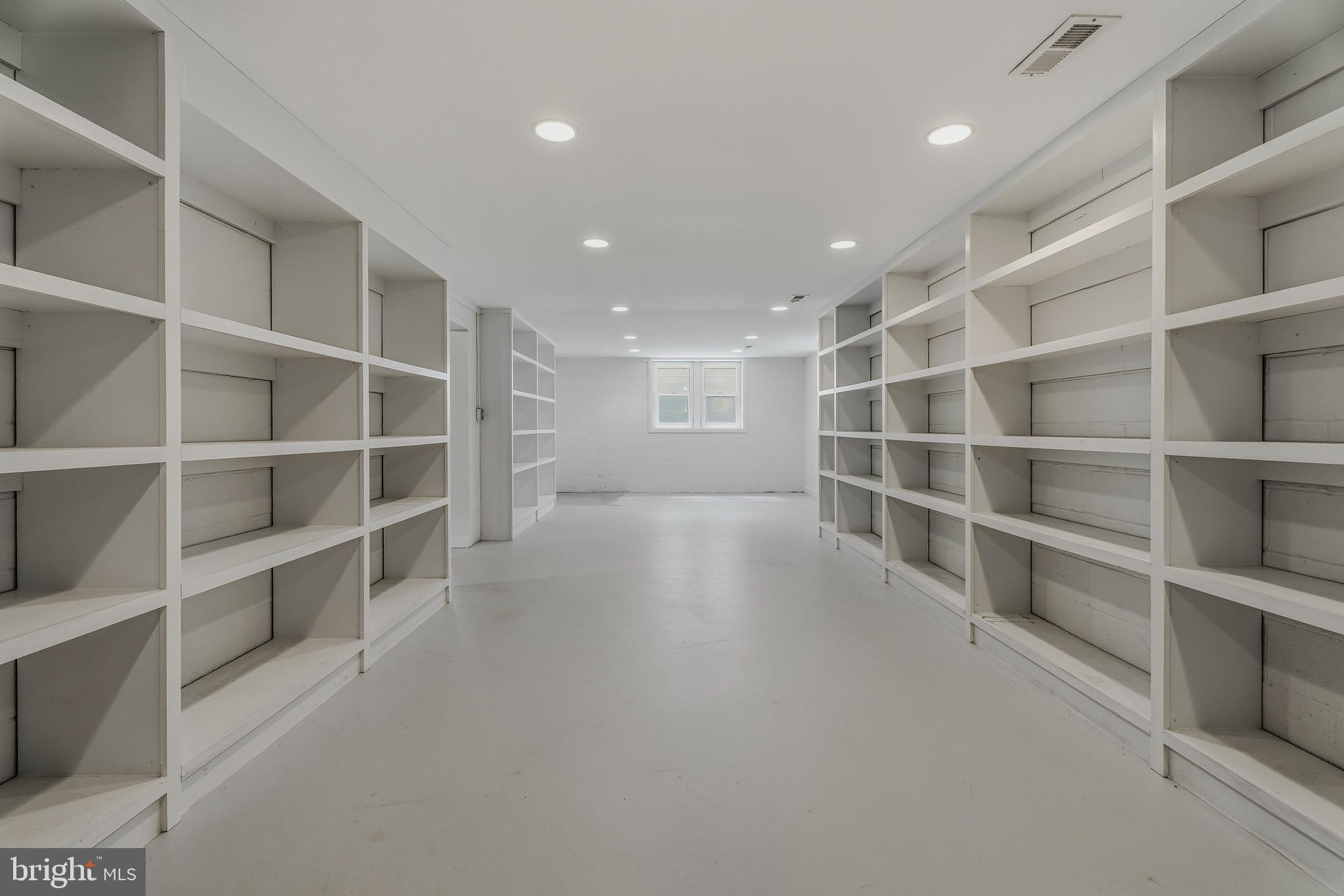 2425 Albert Rill Road Hampstead, MD 21074 - Photo 38 of 44 a view of an empty room with shelves