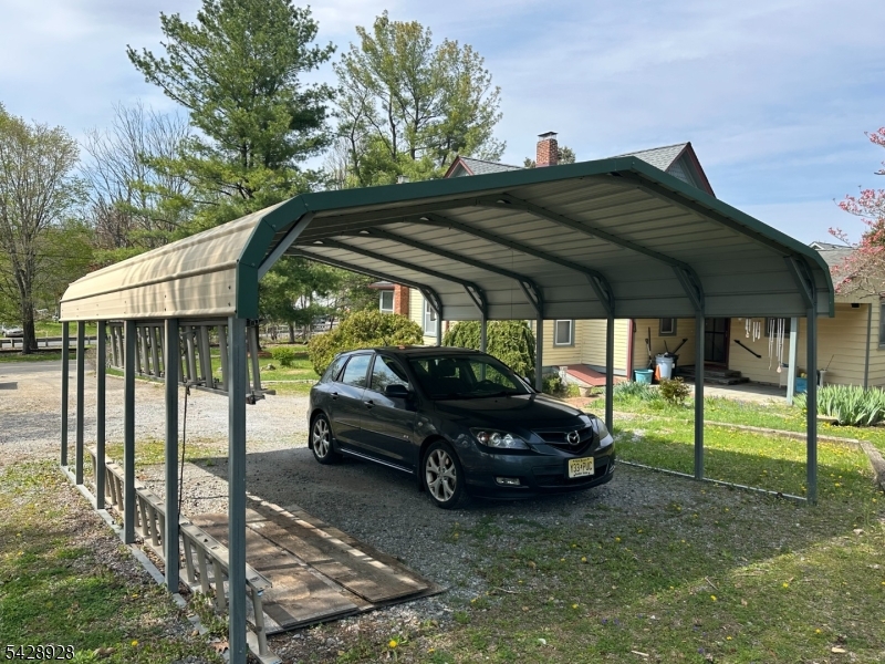 13 Cemetery Road Great Meadows, NJ 07838 - Photo 18 of 20 a car parked in front of a house
