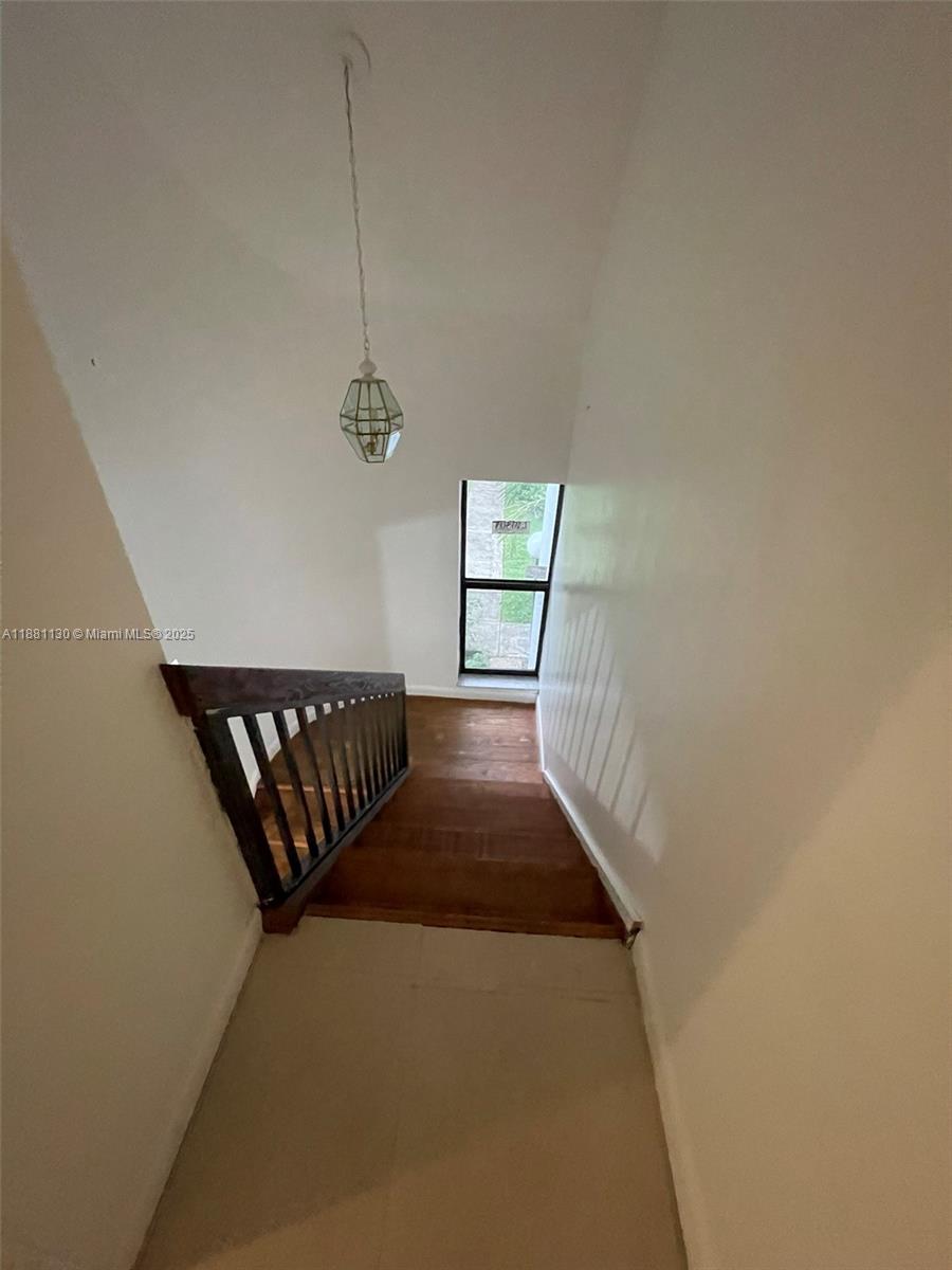 2718 South University Drive, Unit 17C Davie, FL 33328 - Photo 11 of 26 View facing downstairs from 2nd floor