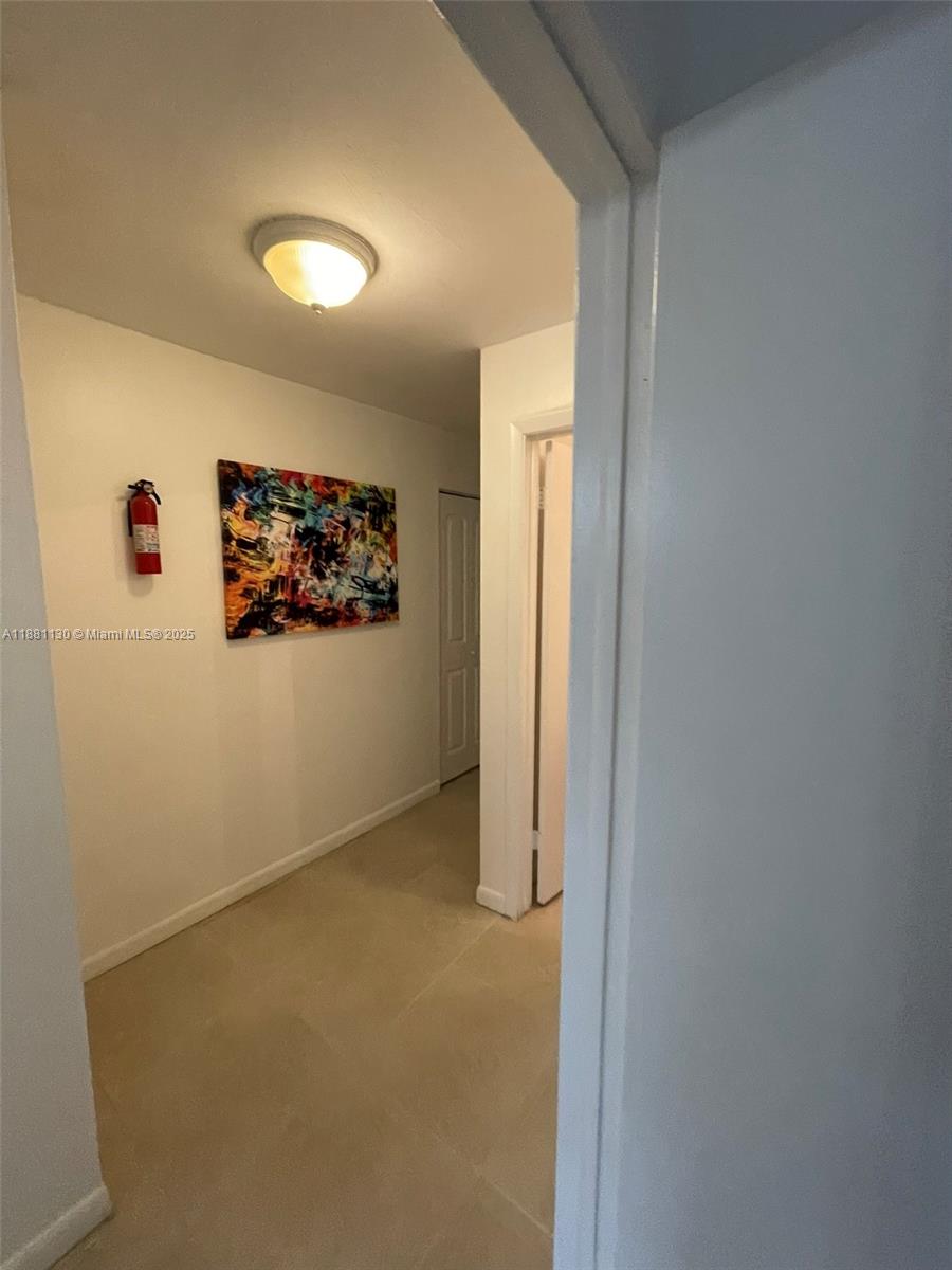 2718 South University Drive, Unit 17C Davie, FL 33328 - Photo 12 of 26 2nd floor hallway
