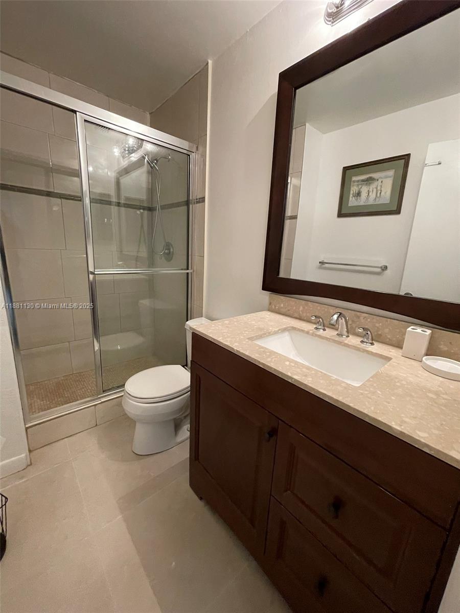 2718 South University Drive, Unit 17C Davie, FL 33328 - Photo 22 of 26 2nd floor bathroom in hallway