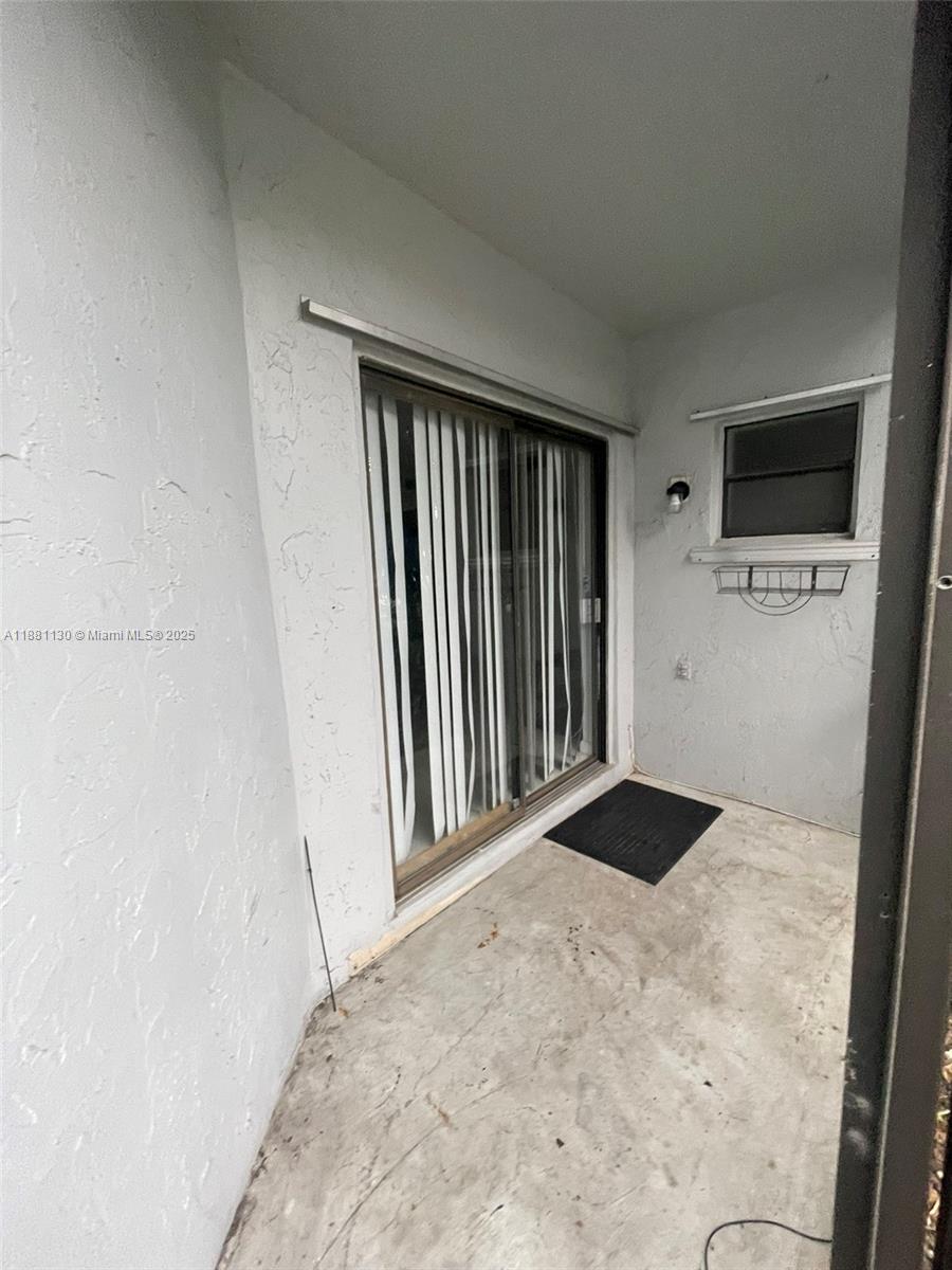 2718 South University Drive, Unit 17C Davie, FL 33328 - Photo 25 of 26 Downstairs balcony 1 of 3