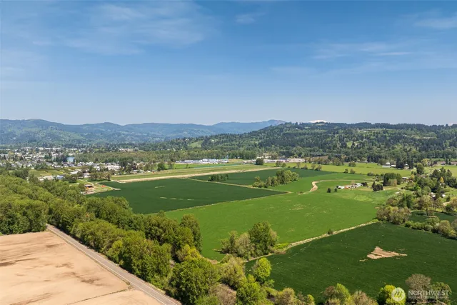 a view of a city with mountains in the background