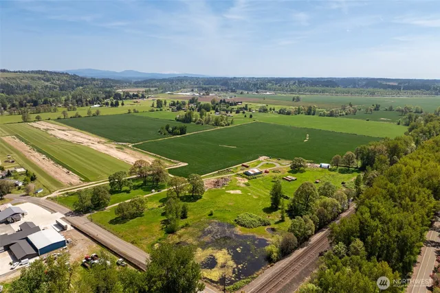 an aerial view of a golf course with a garden
